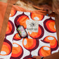 This image features a canvas surfboard cover named "Fleurieu Peninsula Sunset Orange," inspired by the stunning ocean sunsets observed on the south Australia coast. The cover is crafted from durable, waterproof canvas, designed to protect the surfboard from dings, dents, sun, sand, and surf wax.